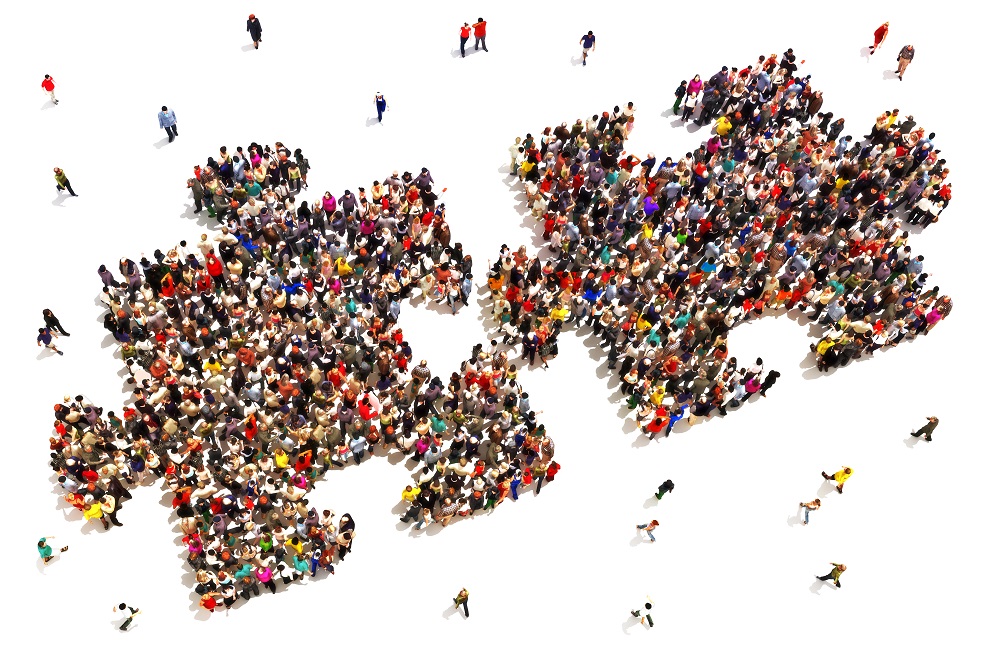 Two jigsaw pieces made out of people