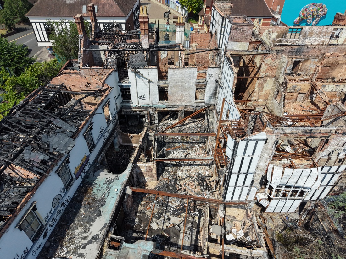 An overhead shot of the fire damaged Raven hotel