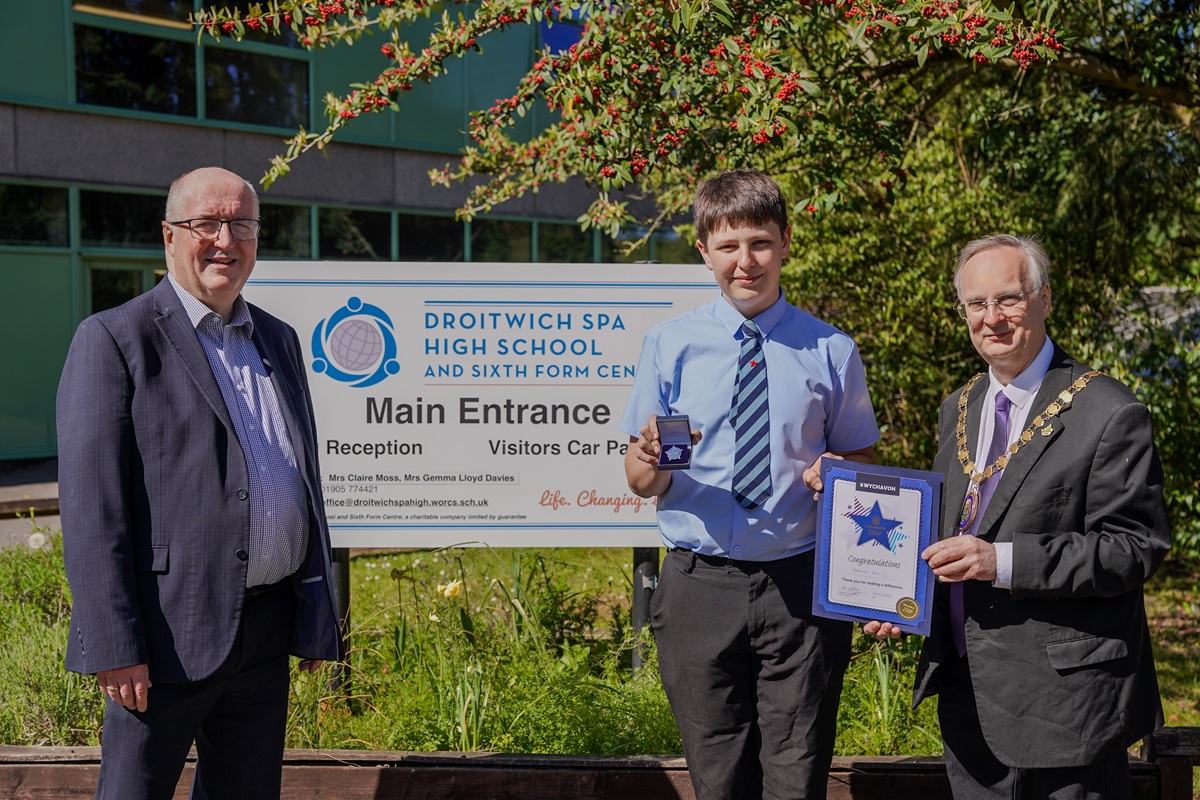 Cllr Morris and Cllr Goode present Matty with a certificate.