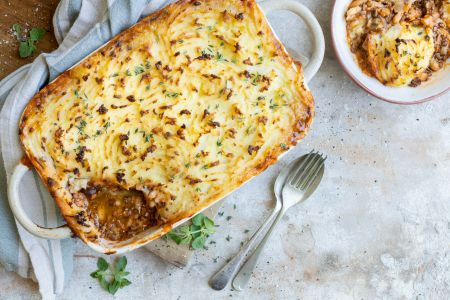 Shepherds pie with fork and spoon utensil
